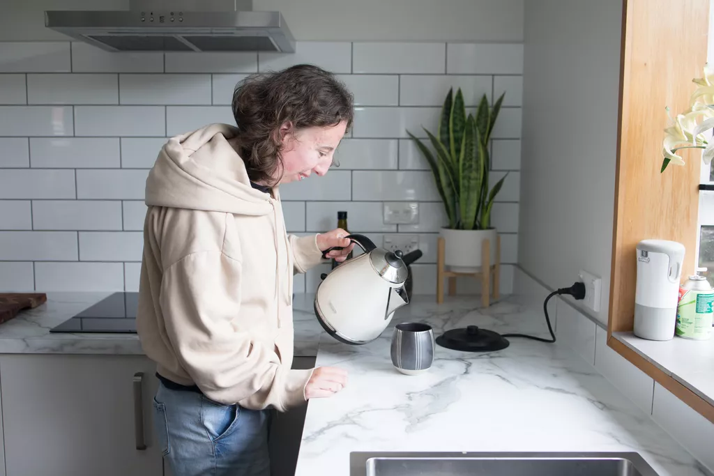 Woman making a cup of tea